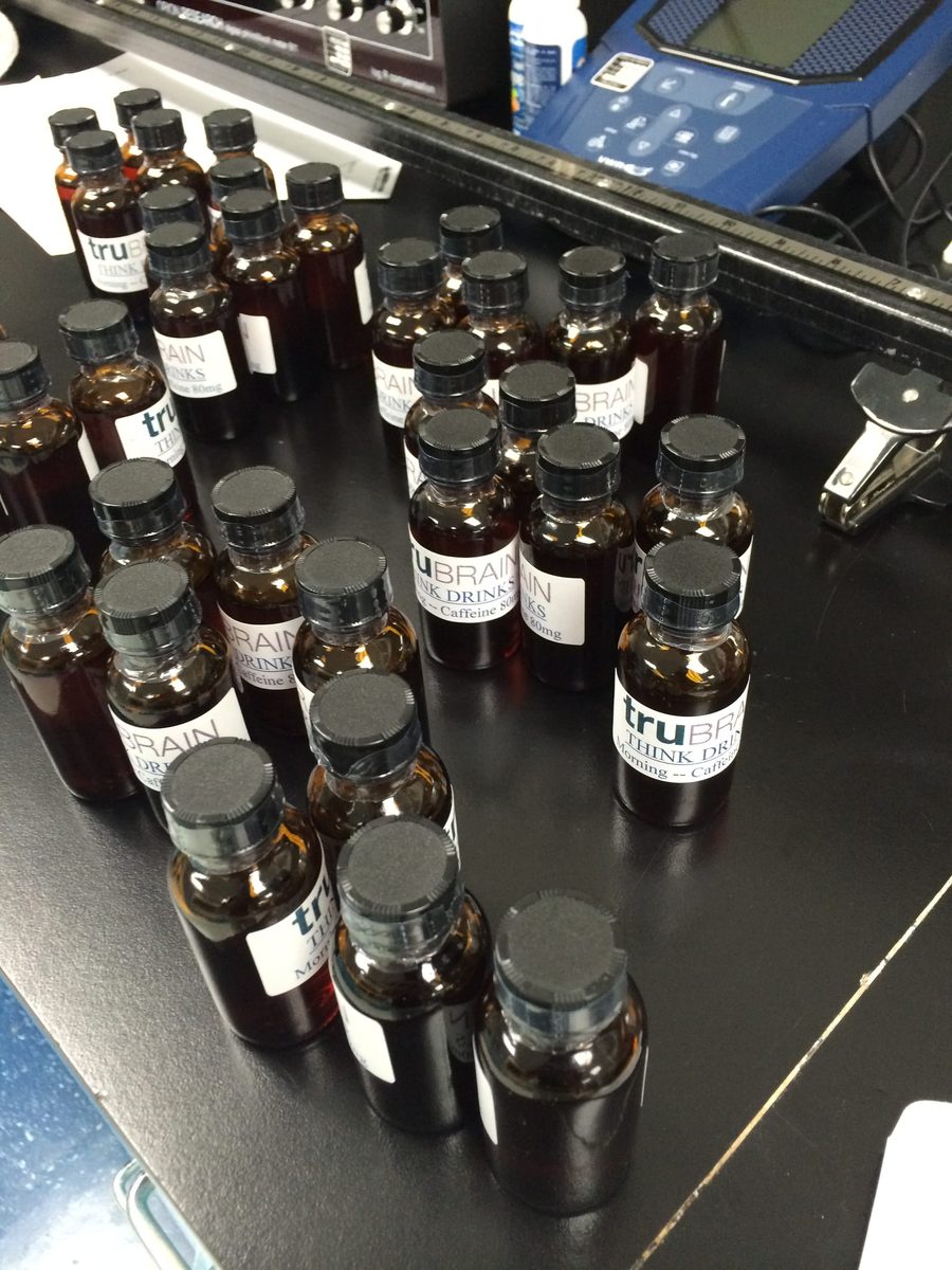 Labeled truBrain think-drink vials